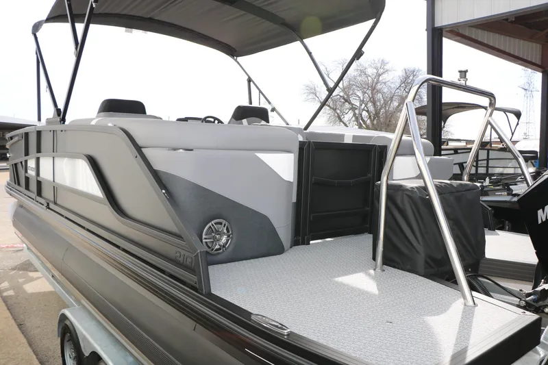 Slide: The Image of 2026 Evotti 521QL pontoon boat with sleek design and modern seating. - 14