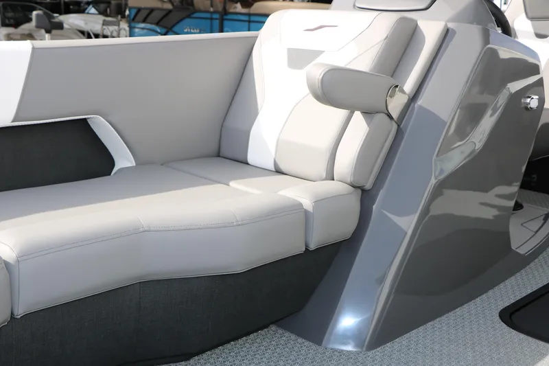 Slide: The Image of Luxurious seating in the 2026 Evotti 521QL boat, featuring sleek gray and white upholstery. - 27