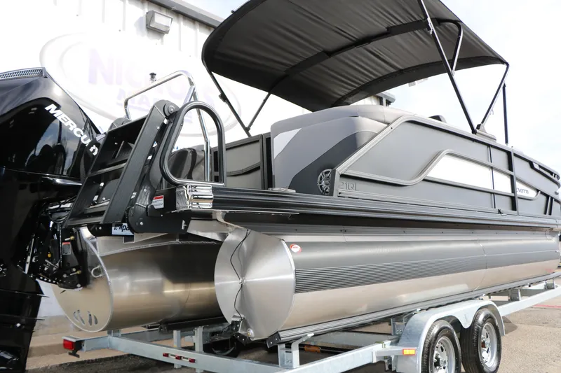 Slide: The Image of 2026 Evotti 521QL pontoon boat on trailer with Mercury engine and canopy. - 4