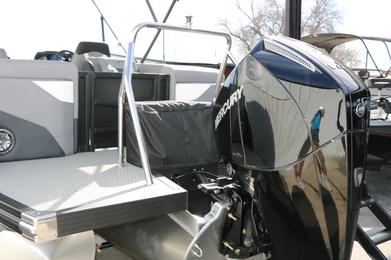 Slide: The Image of 2026 Evotti 521QL boat with Mercury outboard motor, rear deck view. - 63