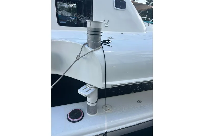 Slide: The Image of White 2002 Custom 64 Stuart Catamarans deck with rope and fittings. - 17