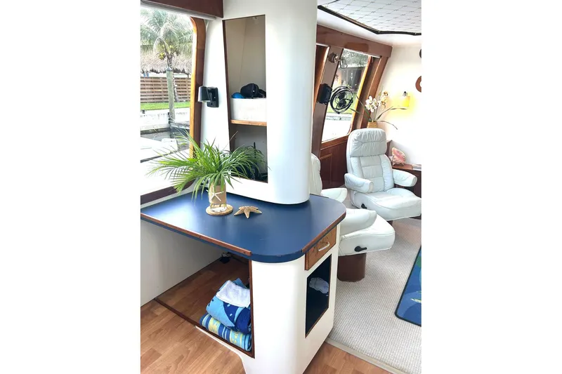 Slide: The Image of Luxurious interior of 2002 Custom 64 Stuart Catamarans with elegant seating and decor. - 26