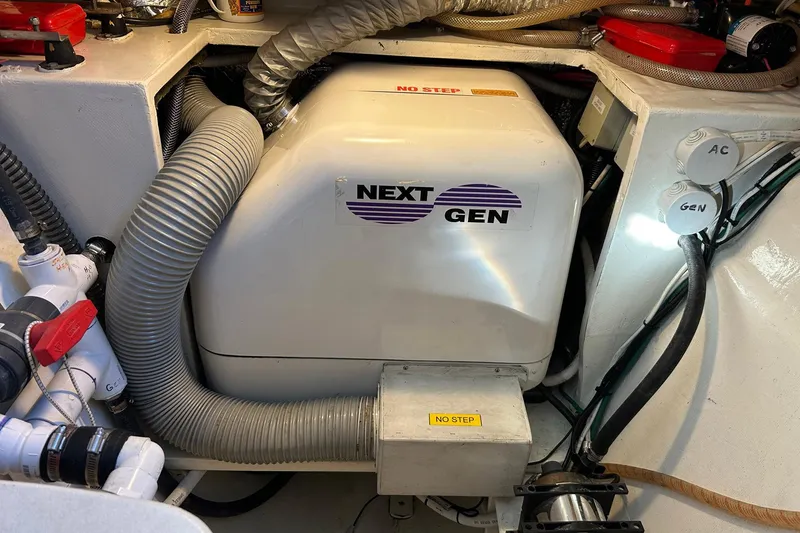 Slide: The Image of Engine room of 2002 Custom 64 Stuart Catamarans with Next Gen generator. - 52