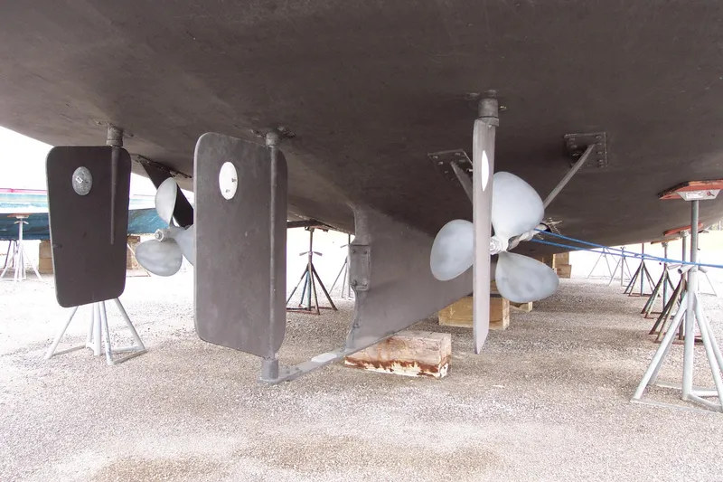 Slide: The Image of Underside view of 1987 Custom Pilgrim Tribute boat with dual propellers and rudders. - 7