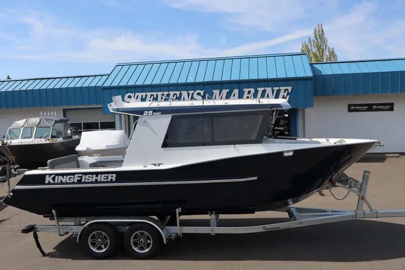 The Image of 2026 KingFisher 25 XAC boat on trailer at Stevens Marine dealership. - 1