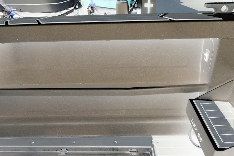 Slide: The Image of Interior view of 2026 KingFisher 25 XAC boat, showcasing sleek design and modern features. - 14