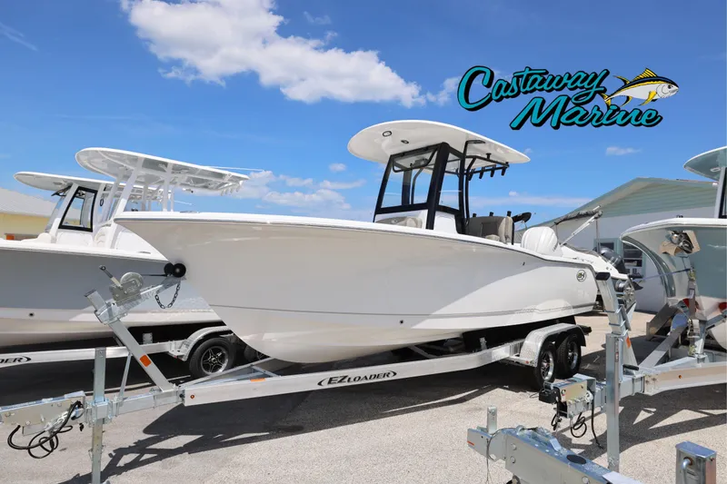 The Image of 2026 Sea Hunt Ultra 239 SE boat on trailer at Castaway Marine dealership. - 0