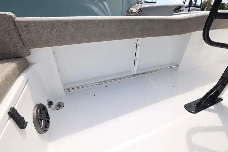Slide: The Image of Control panel of 2026 Sea Hunt Ultra 239 SE boat with electronic equipment. - 11