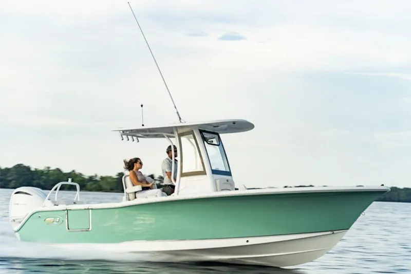 Slide: The Image of Interior view of 2026 Sea Hunt Ultra 239 SE boat with cushioned seating. - 19