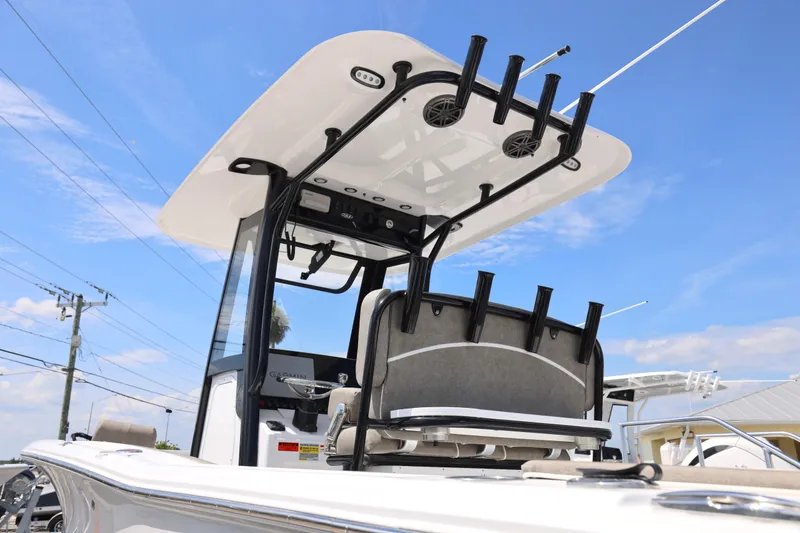 Slide: The Image of 2026 Sea Hunt Ultra 239 SE boat with cushioned seating and built-in speakers. - 5