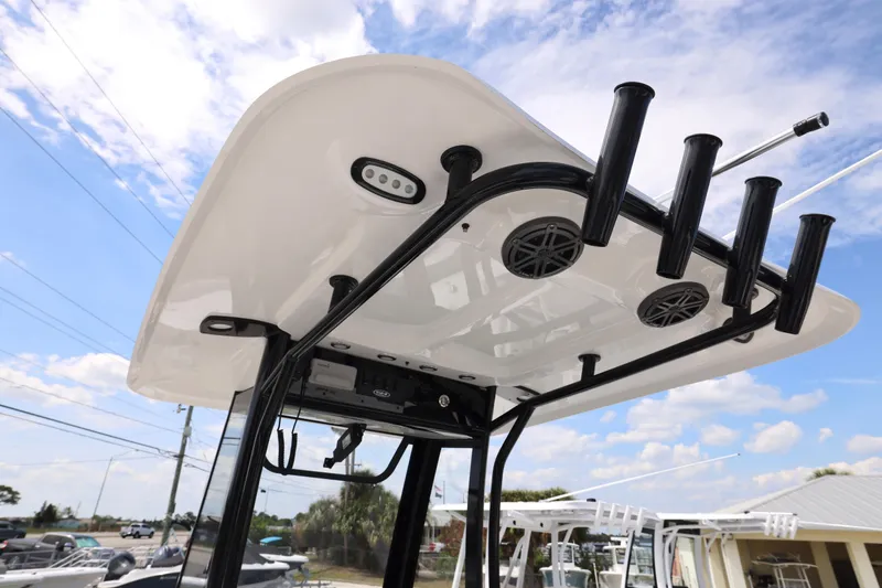 Slide: The Image of Interior seating of 2026 Sea Hunt Ultra 239 SE boat, featuring cushioned seats and storage. - 9
