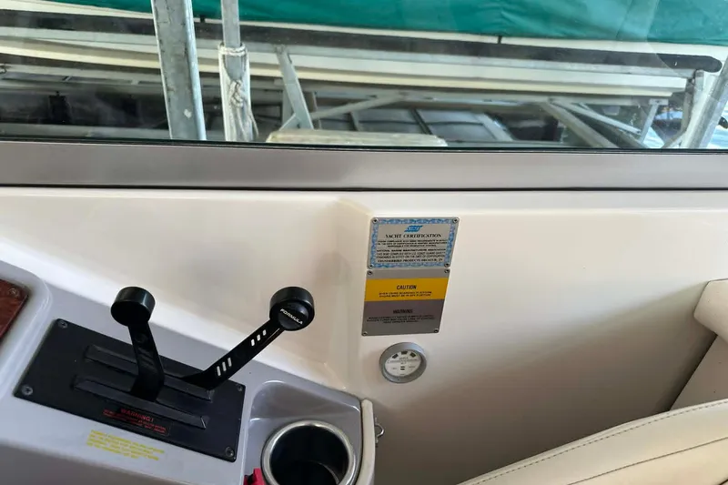 Slide: The Image of Control panel of a 2002 Formula 280 Bowrider boat with certification label. - 27