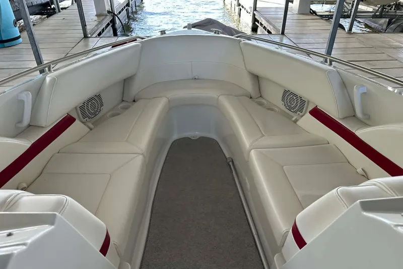 Slide: The Image of 2002 Formula 280 Bowrider interior with white seating and red accents. - 33