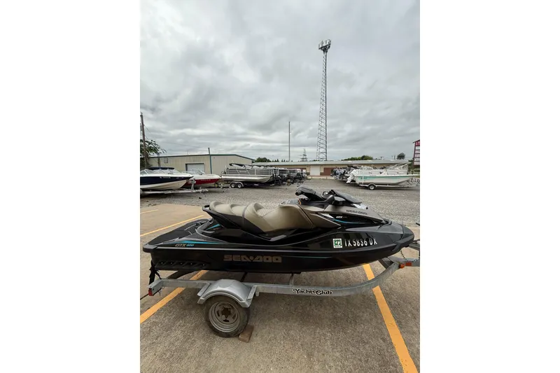Slide: The Image of 2017 Sea-Doo GTX Limited 300 jet ski on trailer in parking lot. - 6