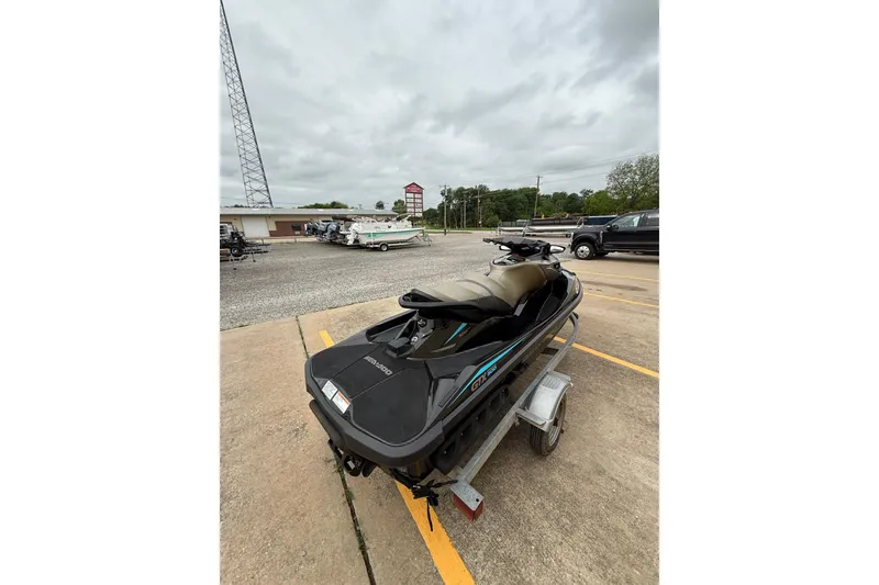 Slide: The Image of 2017 Sea-Doo GTX Limited 300 jet ski on trailer in parking lot. - 7