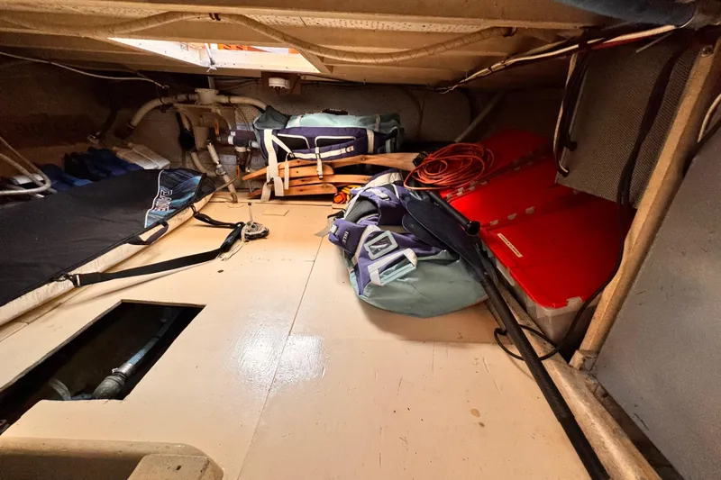 Slide: The Image of Interior of 1978 Roughwater 41 boat with storage and equipment. - 61