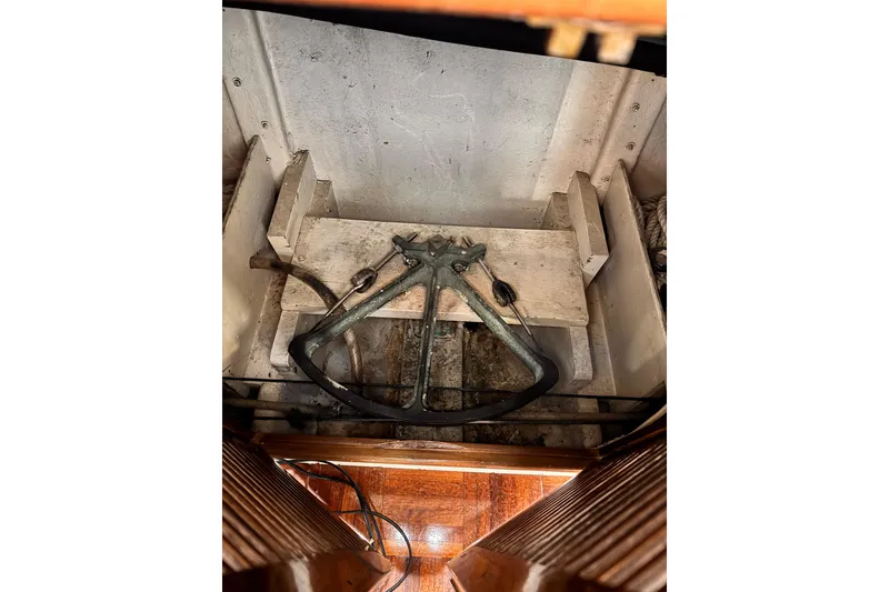 Slide: The Image of 1978 Roughwater 41 boat interior showing anchor storage compartment. - 63