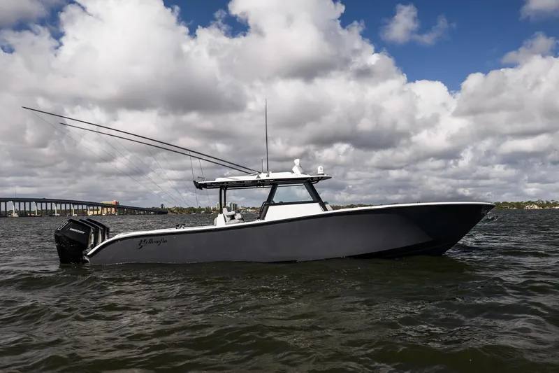 The Image of 2023 Yellowfin 42 Offshore boat on water under cloudy sky. - 1
