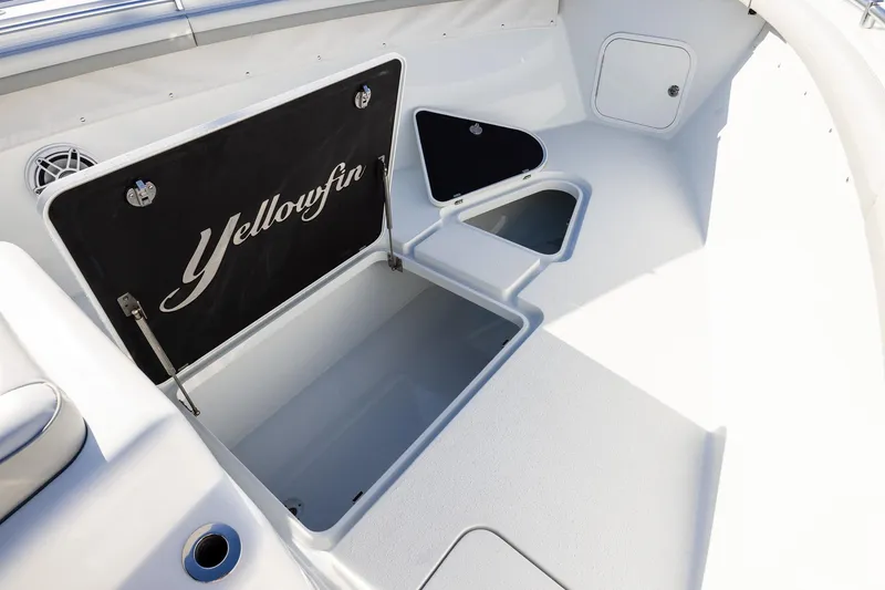 Slide: The Image of 2023 Yellowfin 42 Offshore boat storage compartments, open and spacious design. - 14