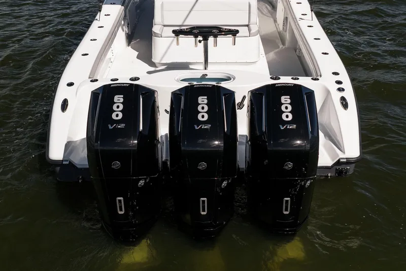 Slide: The Image of 2023 Yellowfin 42 Offshore boat with triple Mercury 600 V12 engines on water. - 40