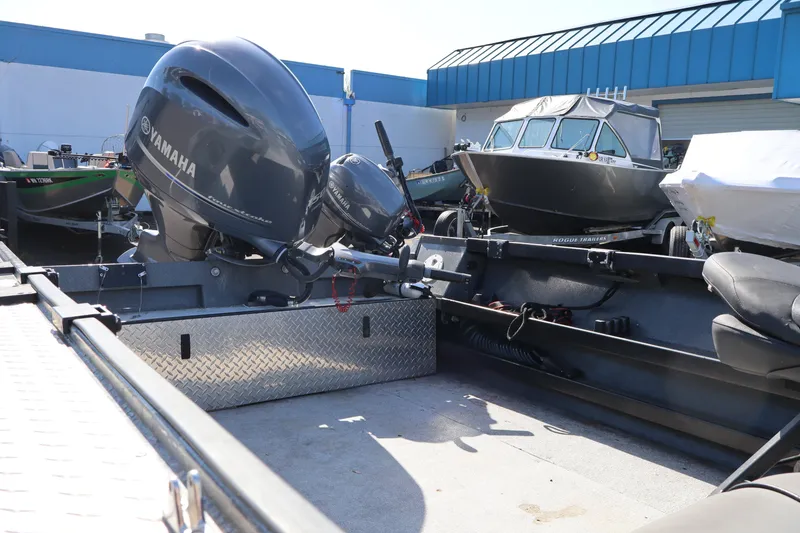 Slide: The Image of 2017 Alumaweld Super Vee LT boat with Yamaha outboard motor in a dealership lot. - 10