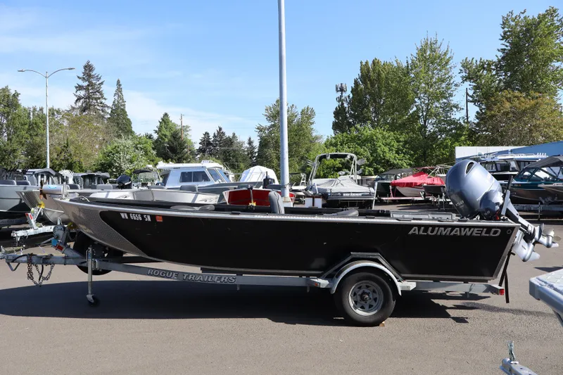 Slide: The Image of 2017 Alumaweld Super Vee LT boat on Rogue trailer in parking lot. - 3