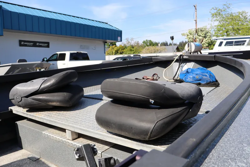 Slide: The Image of 2017 Alumaweld Super Vee LT boat interior with folded seats and equipment. - 8