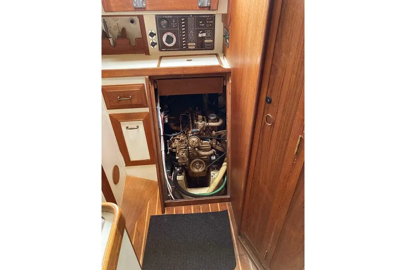 Slide: The Image of Engine compartment of a 1984 Cape Dory 31C sailboat, showcasing interior details. - 21