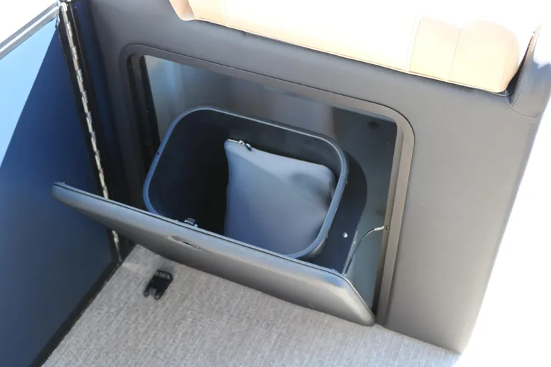 Slide: The Image of Storage compartment in 2026 Evotti 525 QL Tri-Toon boat interior. - 40