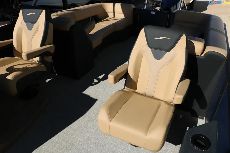 Slide: The Image of Luxurious seating on the 2026 Evotti 525 QL Tri-Toon boat, featuring tan upholstery. - 33