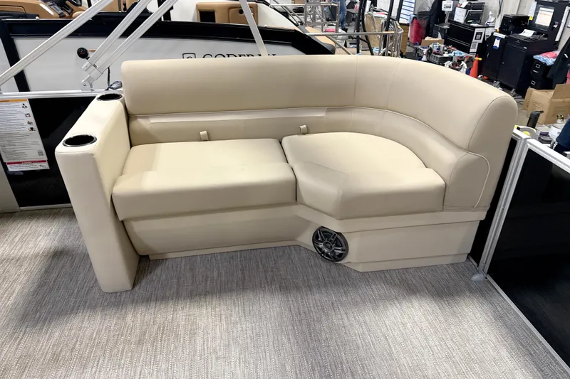 Slide: The Image of Beige seating on 2026 Godfrey EX 2286 SBX boat with cup holders and speaker. - 5
