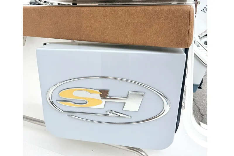 Slide: The Image of 2025 Sea Hunt Ultra 275 SE logo detail with brown cushion. - 4
