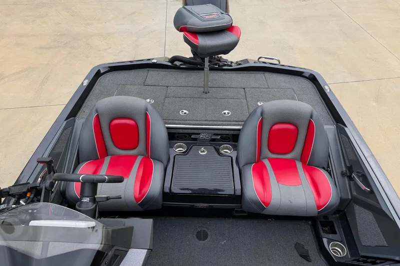 Slide: The Image of 2023 Ranger Z518 boat interior with red and gray seats, showcasing modern design. - 6