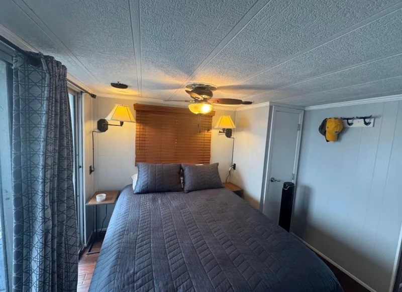 Slide: The Image of Cozy bedroom in a 1984 Sommerset Worlds Fair Edition RV. - 6