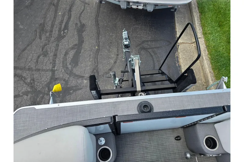 Slide: The Image of Top view of 2023 Crest Classic LX 200 boat trailer hitch and deck area. - 23