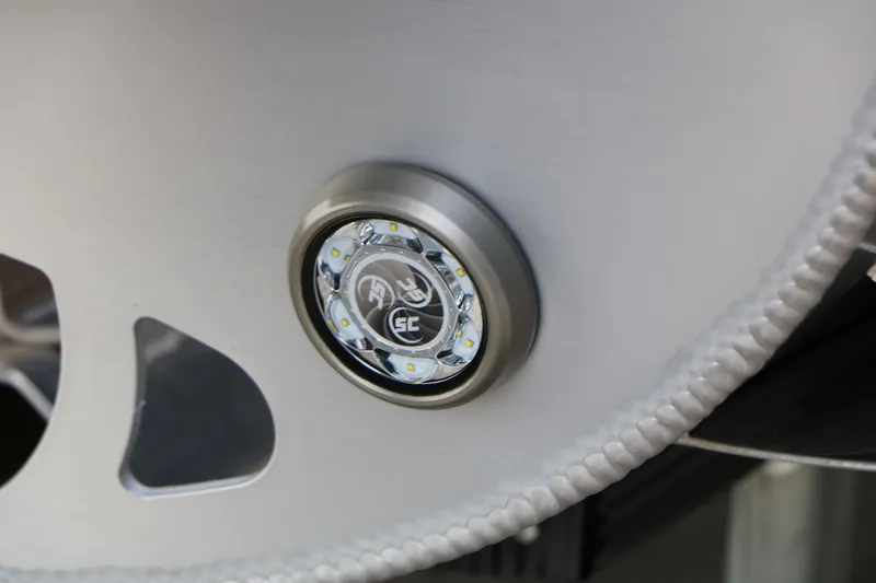 Slide: The Image of Close-up of Evotti 723QL 2026 LED light detail on metallic surface. - 17