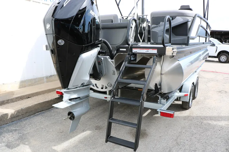 Slide: The Image of 2026 Evotti 723QL pontoon boat with powerful outboard motor and rear boarding ladder. - 56