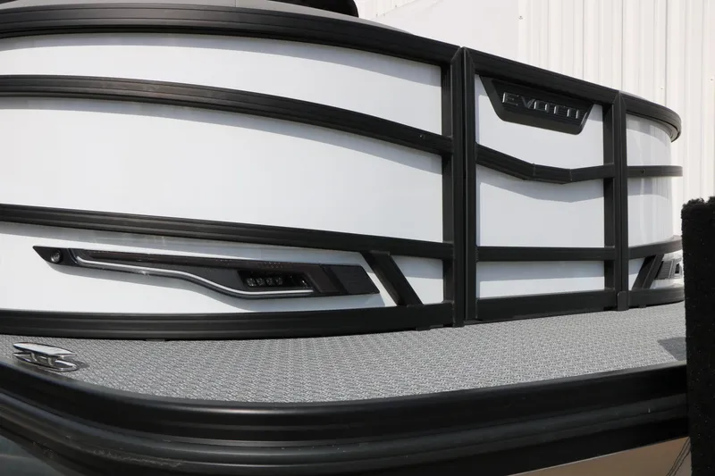 Slide: The Image of 2026 Evotti 723QL boat, sleek design with black trim and modern detailing. - 3