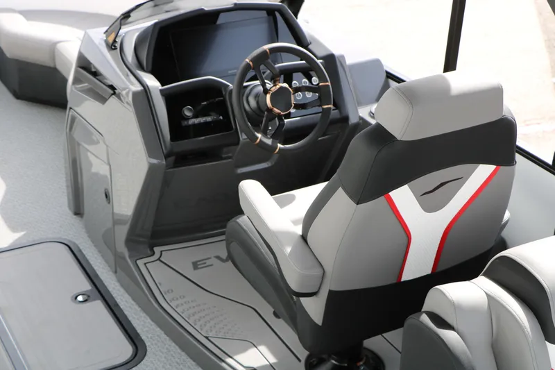 Slide: The Image of Interior of 2026 Evotti 723QL boat, featuring modern steering and seating design. - 31