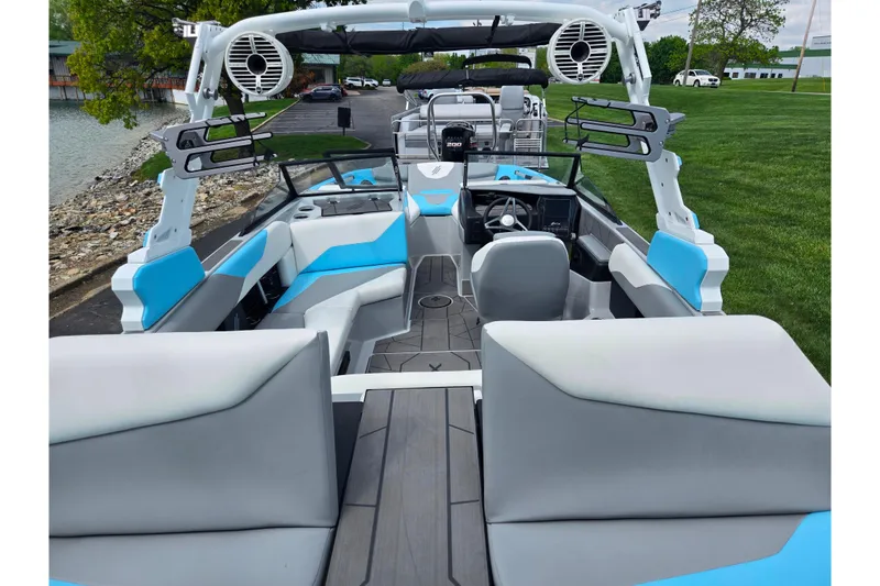 Slide: The Image of 2023 ATX Surf Boats 20 Type-S interior with modern seating and audio system. - 11