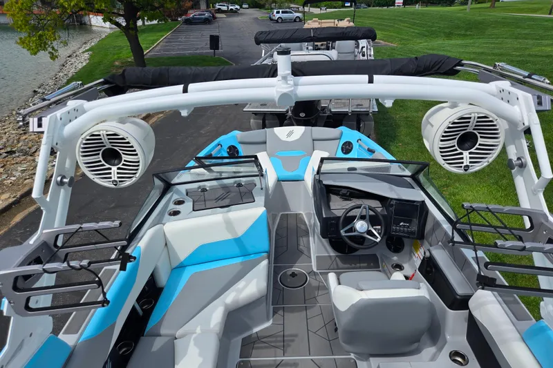 Slide: The Image of 2023 ATX Surf Boats 20 Type-S interior with modern design and advanced audio system. - 13