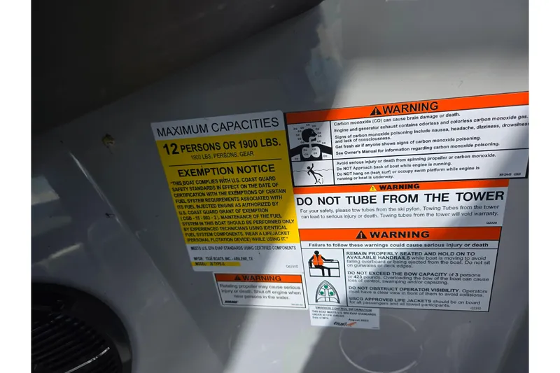 Slide: The Image of 2023 ATX Surf Boats 20 Type-S warning labels detailing capacity and safety instructions. - 16