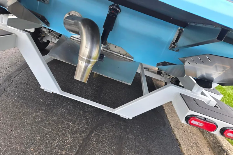 Slide: The Image of 2023 ATX Surf Boats 20 Type-S trailer with exhaust and rear view. - 3