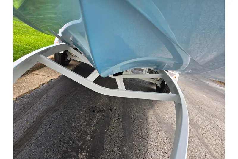 Slide: The Image of 2023 ATX Surf Boats 20 Type-S hull on trailer, showcasing sleek design and craftsmanship. - 8