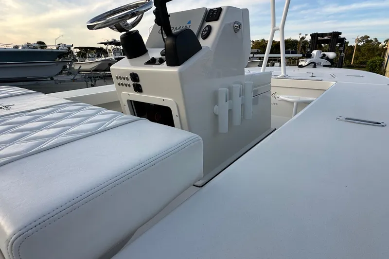 Slide: The Image of 2021 Beavertail Skiffs Vengeance boat interior with steering console and seating. - 13
