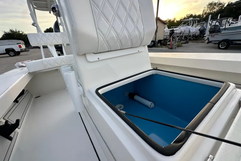 Slide: The Image of 2021 Beavertail Skiffs Vengeance boat interior with open storage compartment and seating. - 18