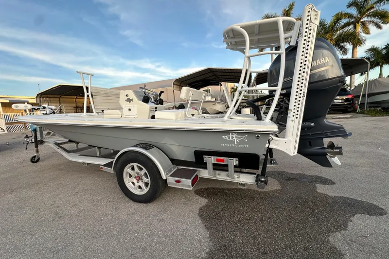Slide: The Image of 2021 Beavertail Skiffs Vengeance boat on trailer, featuring Yamaha outboard motor. - 4