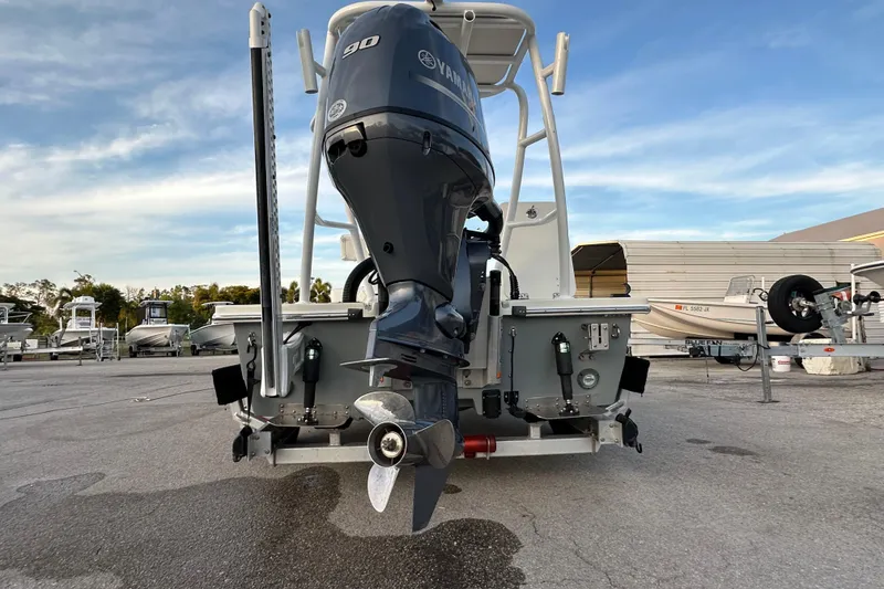 Slide: The Image of 2021 Beavertail Skiffs Vengeance with Yamaha 90 outboard motor, parked on a lot. - 6