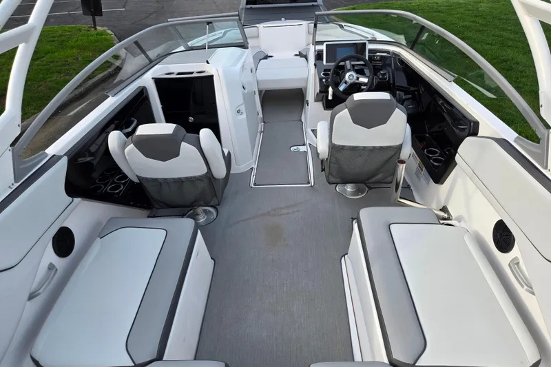 Slide: The Image of 2021 Yamaha Boats AR250 interior with modern seating and sleek design. - 10
