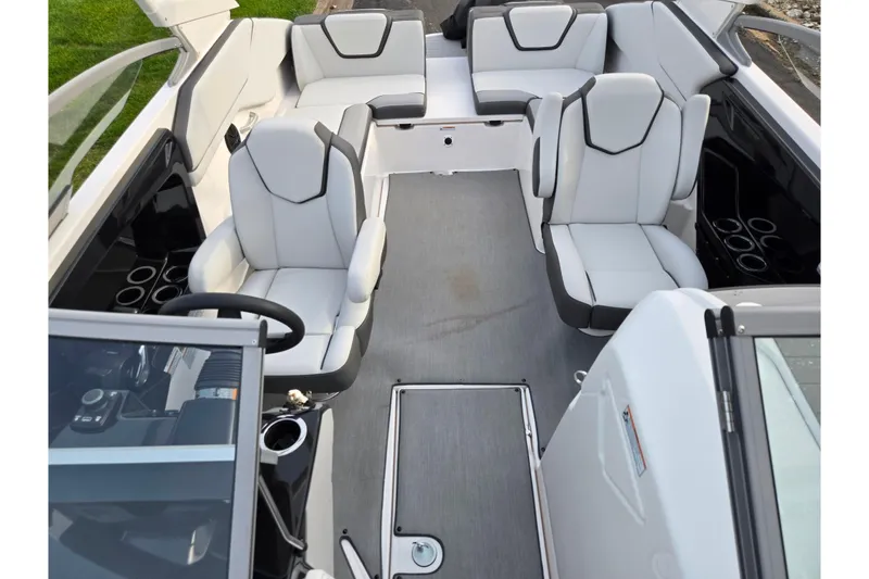 Slide: The Image of 2021 Yamaha Boats AR250 interior with sleek seating and modern design. - 20